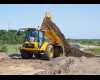 912G HM Front View MT Unloading City Site